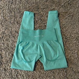 NVGTN contour seamless leggings size small, color is turquoise